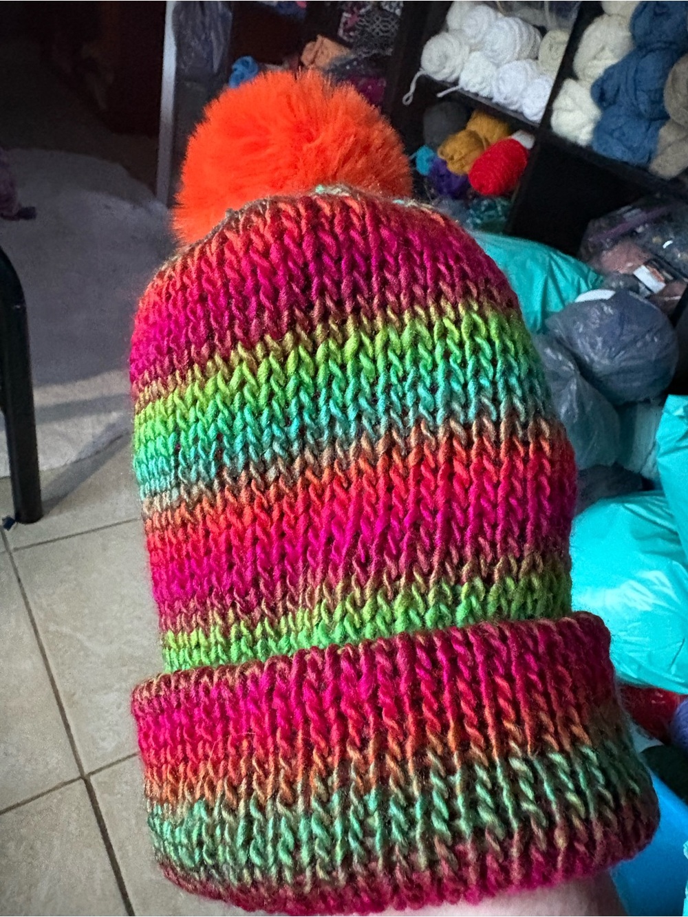 Hand made Rainbow Knit Beanie with Bright Orange Pom